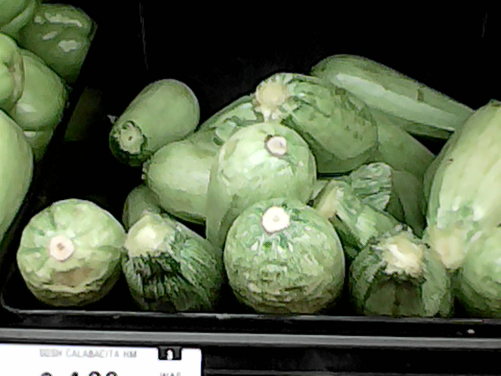 Squash on the shelf at the grocery store.